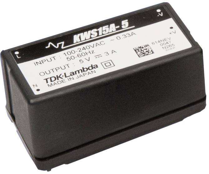 Čierna elektronická súčiastka s bielou etiketou zobrazuje: 'KWS15A-5', vstupné a výstupné údaje, výrobca: TDK-Lambda, Japonsko.