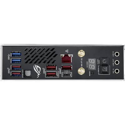 'Zadná časť počítača so vstupmi, zobrazuje USB porty, Ethernet, USB-C, audio konektory a WiFi anténu. LED displej indikuje stav.'