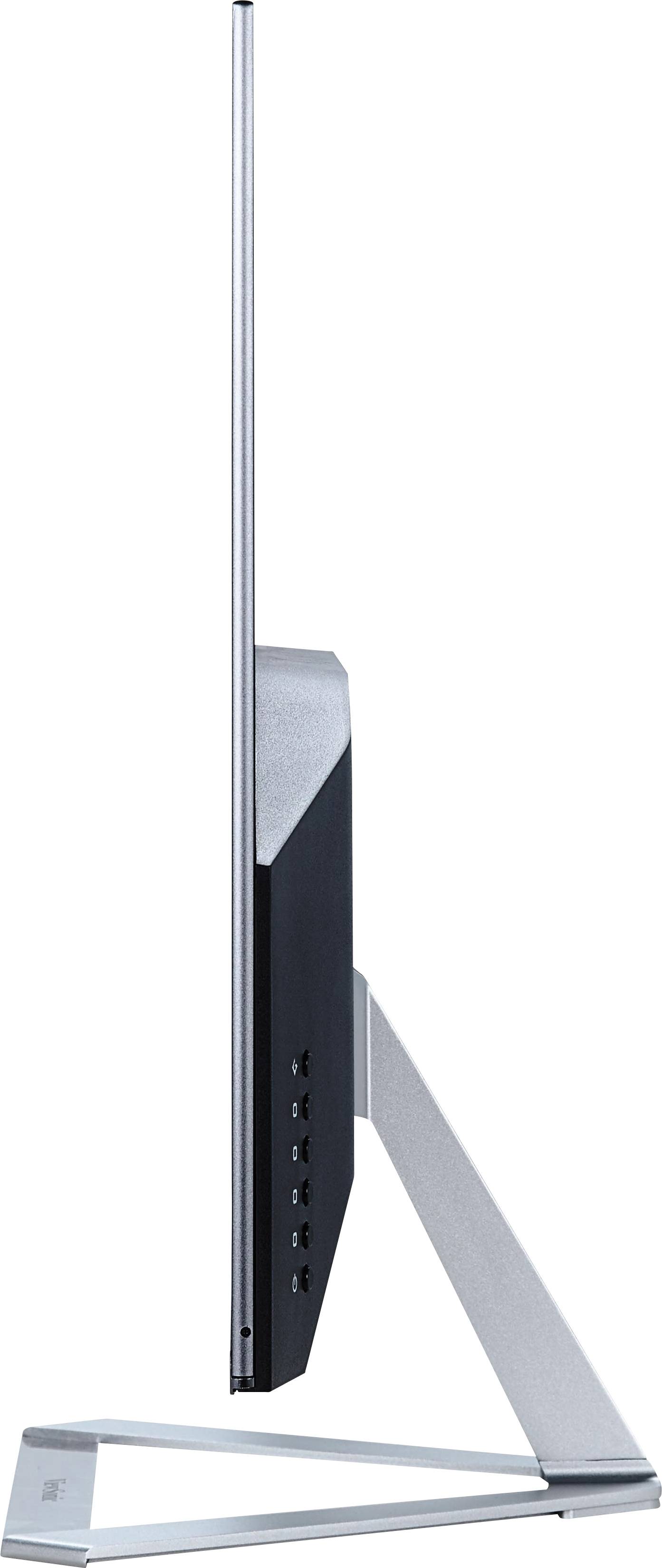 Pohľad zboku na mimoriadne tenký monitor s moderným stojanom. Obrazovka je veľmi štíhla a elegantná.