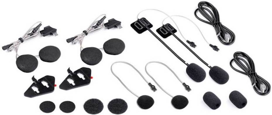 Súprava mikrofónov a príslušenstva pozostávajúca z káblov, slúchadiel, mikrofónových svoriek a odnímateľných krytov určená na komunikačné účely.