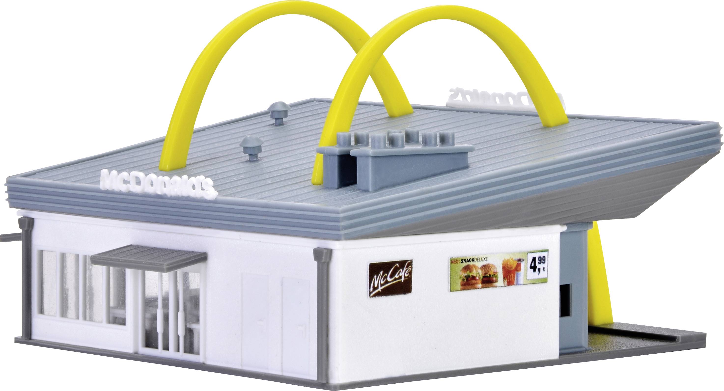 Miniaturový model rýchleho občerstvenia s charakteristickými žltými oblúkmi na streche.