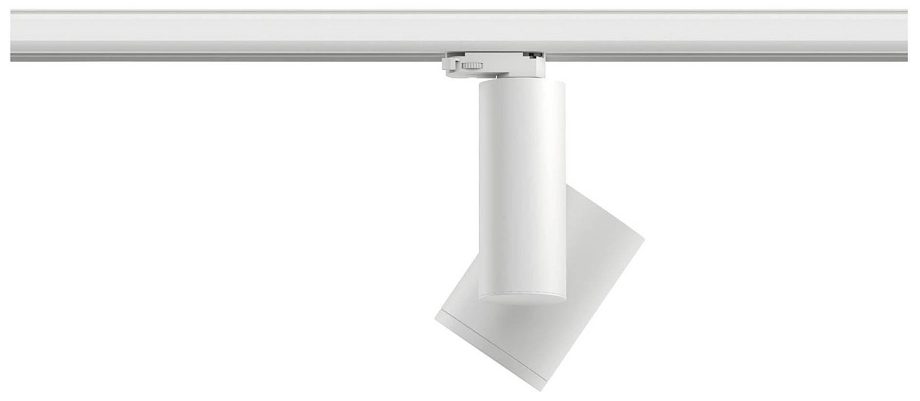 Biela cylindrická koľajnicová lampa je namontovaná na strope. Je smerovaná smerom nadol a má minimalistický dizajn.