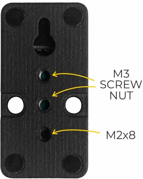 "Čierna kovová doska s dvoma vyznačenými otvormi pre skrutky, s maticou "M3 Screw Nut" a otvorom "M2x8"."