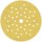 Guľatý, žltý brúsny papier s mnohými malými dierkami a jednou väčšou dierou v strede.