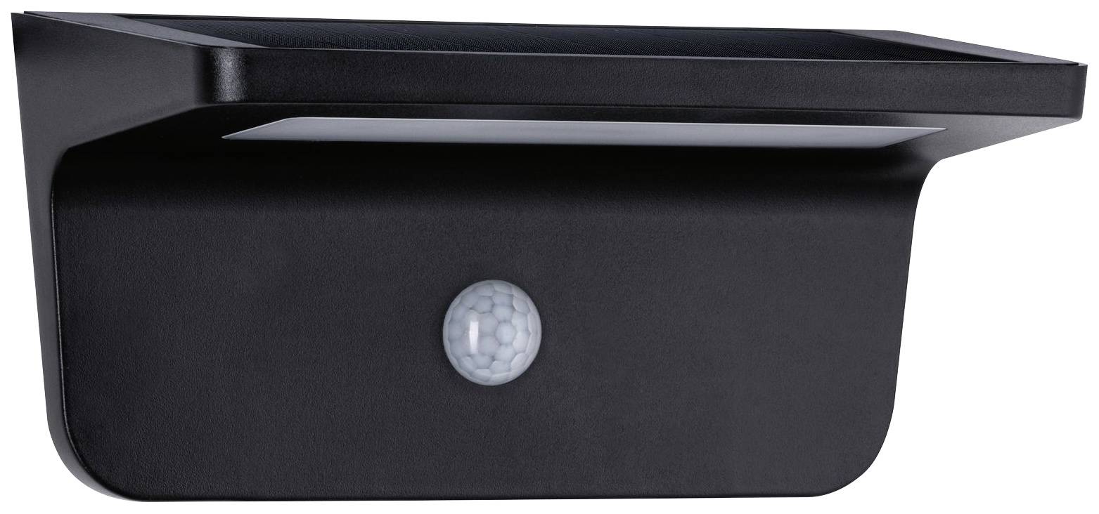 Čierna, na stenu montovaná vonkajšia lampa s integrovaným pohybovým senzorom v strede. Moderný, jednoduchý dizajn pre vonkajšie osvetlenie.