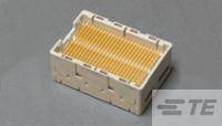 Obdĺžnikový elektronický konektor s viacerými žltými kolíkmi na sivom povrchu.