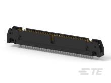 Elektronická súčiastka v čiernej farbe, s viacerými viditeľnými kovovými kontaktmi. Pravdepodobne konektor pre technické aplikácie.