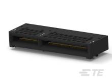 Čierna elektronická súčiastka s dvomi paralelnými konektormi a zlatými kontaktmi, pravdepodobne počítačový port.