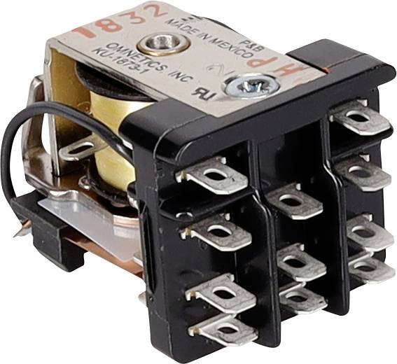 Malé elektrické relé s viacerými kovovými kolíkmi, označené '1832' a 'Vyrobené v Mexiku' na vrchu, používané na prepínanie elektrických obvodov.