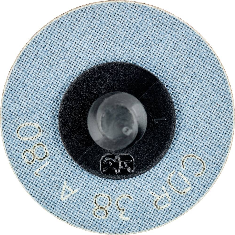 Disk s modrou textilnou povrchovou úpravou, so stredovo umiestneným čiernym plastovým gombíkom. Nápis 'CDR 38 A 180'. Komponent nástroja.