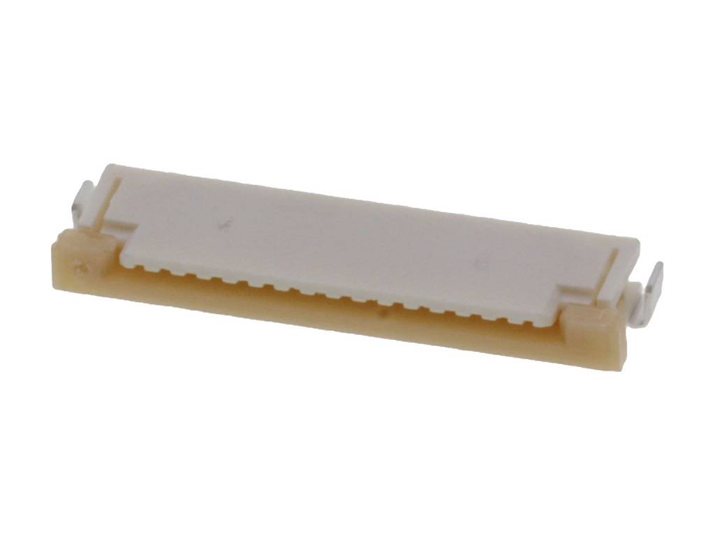 Biely, obdĺžnikový konektor pre elektronické komponenty, plochý a s viacerými pinmi, ležiaci na svetlom povrchu.
