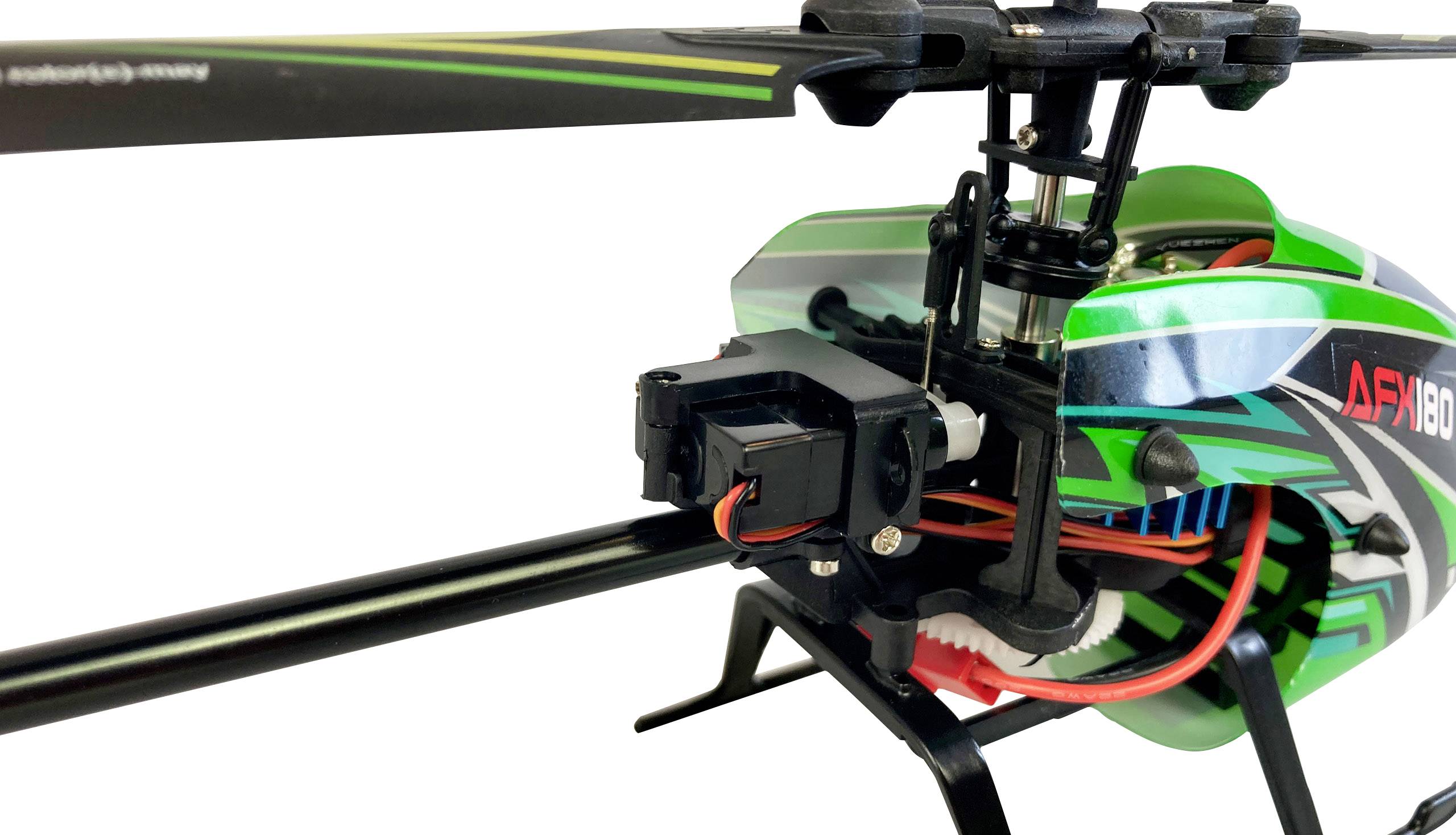 Zelený modelový vrtuľník s rotornými listami a elektronickými súčiastkami na bielom pozadí.