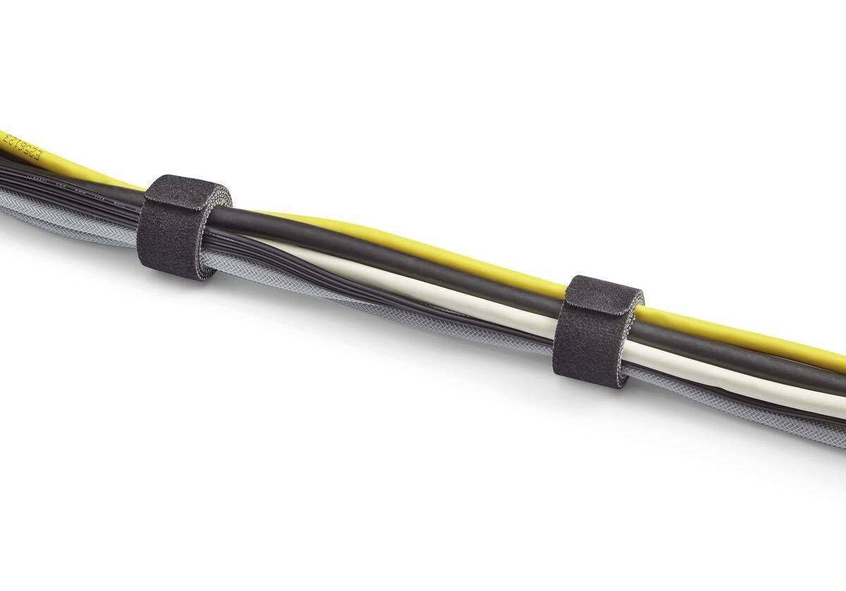 Zväzok viacerých káblov vrátane žltých a čiernych je organizovaný a zviazaný čiernymi suchými zipsami.