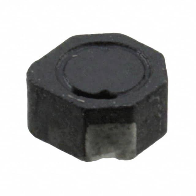 Čierny šesťuholníkový magnet leží na svetlom povrchu.