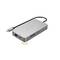 USB-C hub v striebornej farbe s viacerými portami vrátane ethernetového pripojenia, čítačky SD kariet a HDMI. Kábel je pevne pripojený.