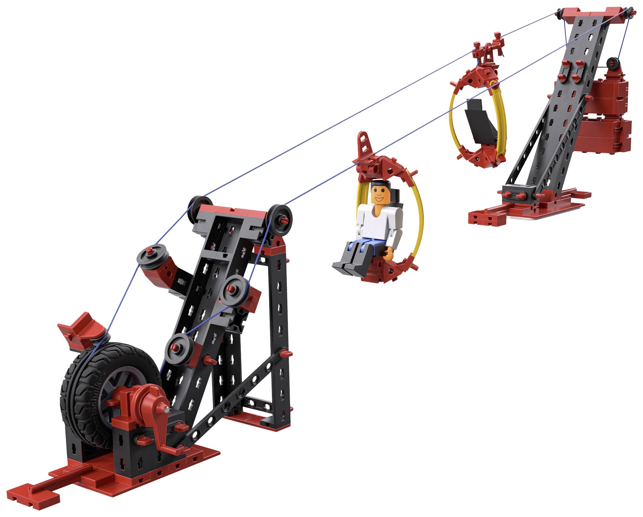 Model lanovky so sedadlom, obklopený dielmi LEGO v čiernej a červenej farbe. Figúrka sedí v žltom kruhu.