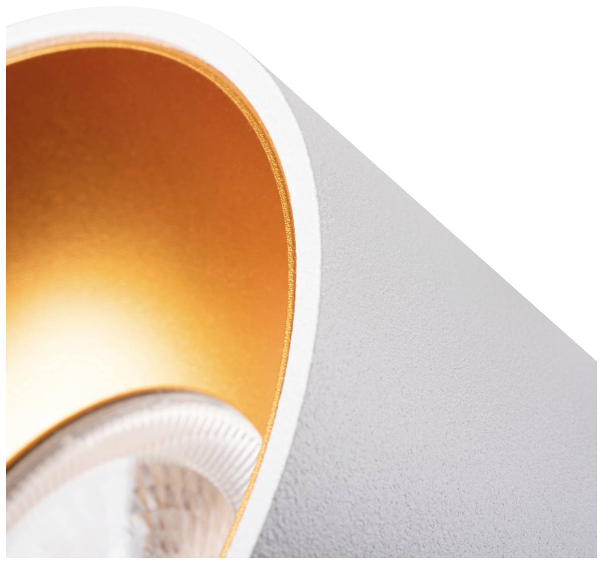 Detailný záber valcovitej lampy s bielym obalom a oranžovým vnútrajškom.