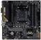 Čierna základná doska s PCIe slotmi, slotmi pre RAM a chladičmi. Označená nápisom 'TUF Gaming' a 'ASUS'.
