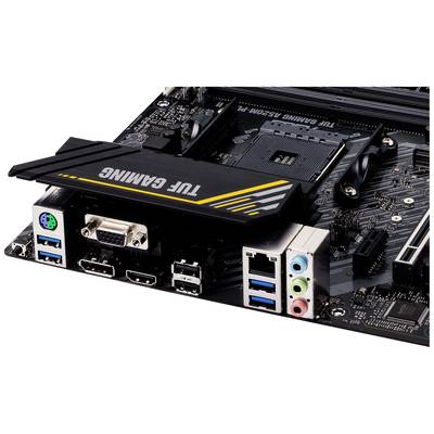 Rohová časť počítačovej základnej dosky s USB portami, HDMI, VGA, ethernetovým a audio konektormi. Nápis 'TUF GAMING' je viditeľný.