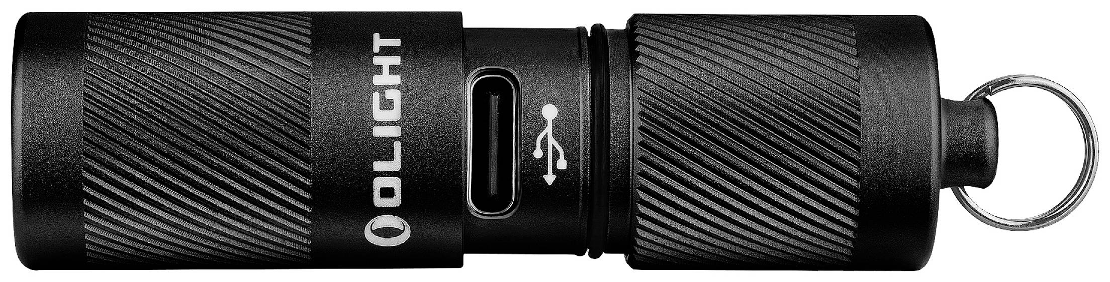 Malá čierna baterka s USB pripojením a krúžkom na kľúče. Kompaktný, valcovitý dizajn s vrúbkovaným povrchom pre lepšie uchopenie.