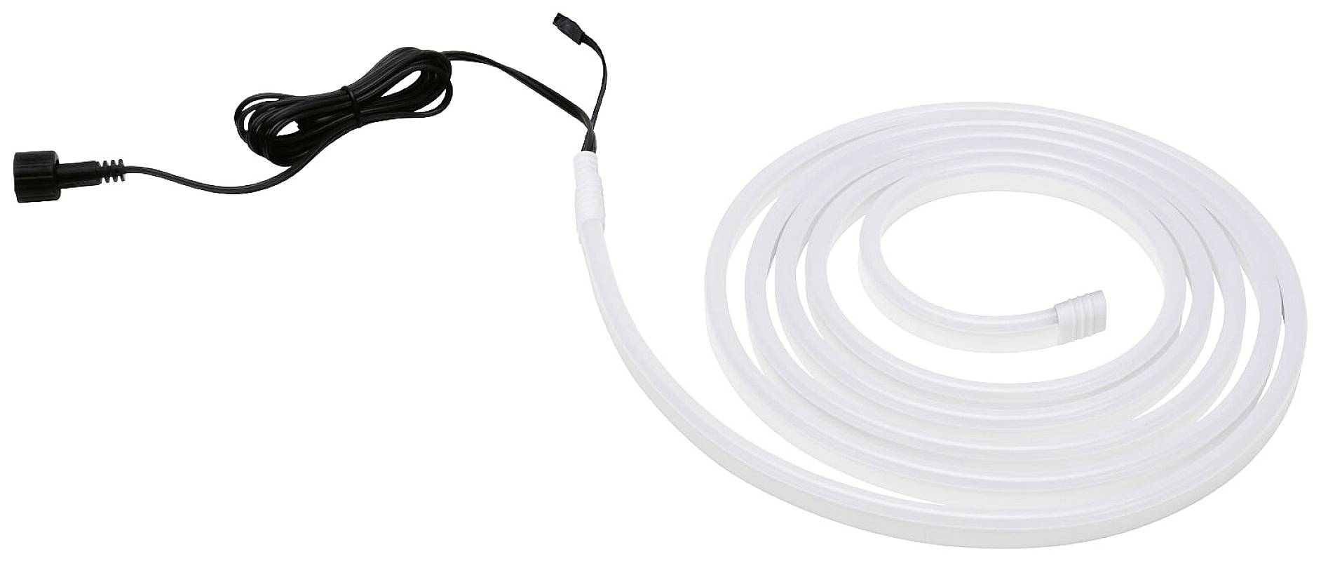 Biely LED svetelný pás s čiernym kábelovým pripojením, rozvinutý na povrchu.