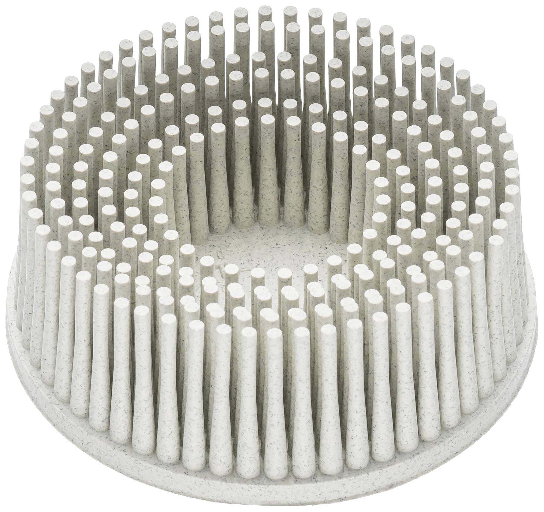 Kruhovitý sivý predmet s vertikálnymi paličkami usporiadanými v koncentrických kruhoch, ktoré pripomínajú štetiny.
