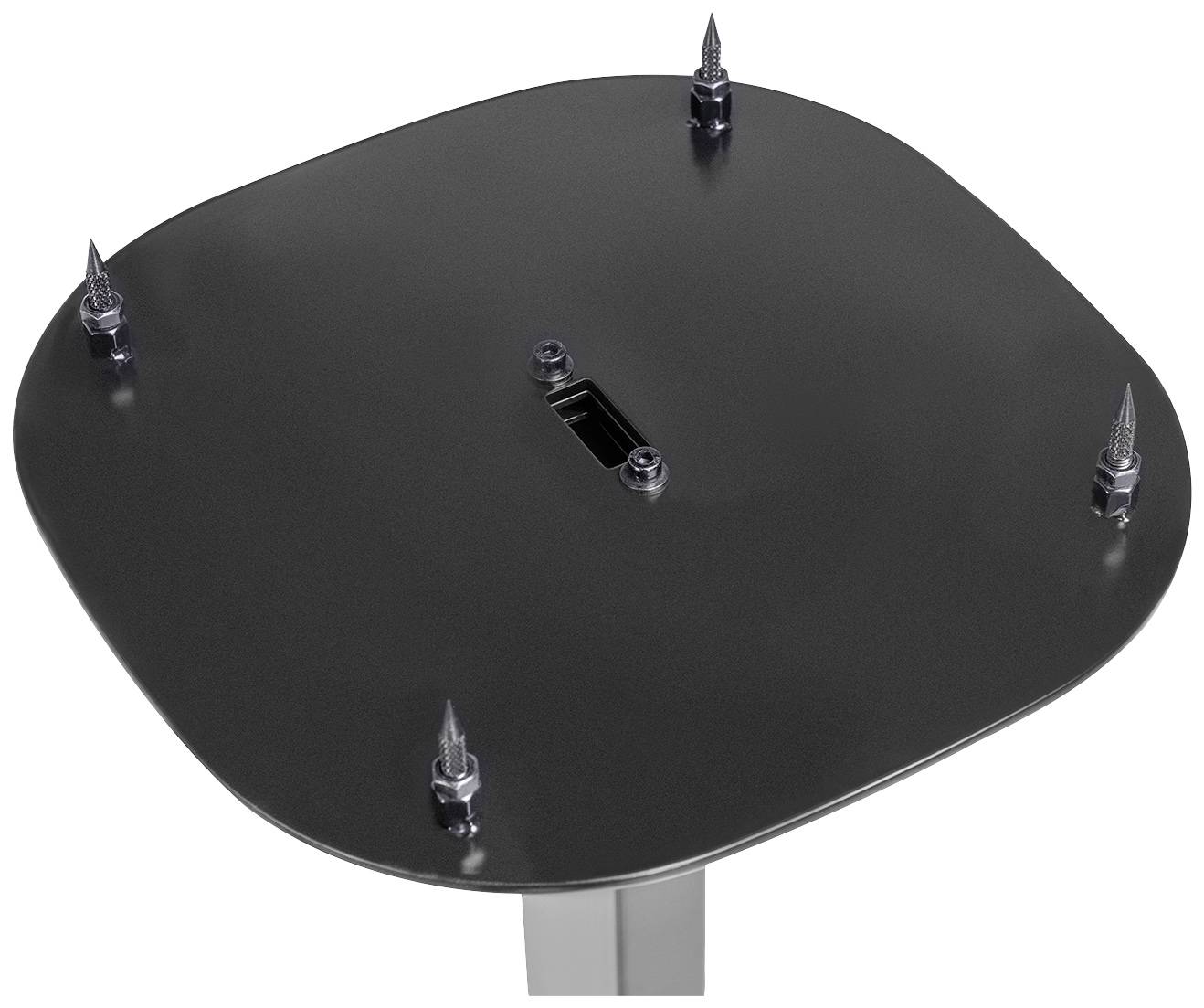 Kovová doska so štyrmi ostrými upevneniami v rohoch, pripevnená k vertikálnej tyči.