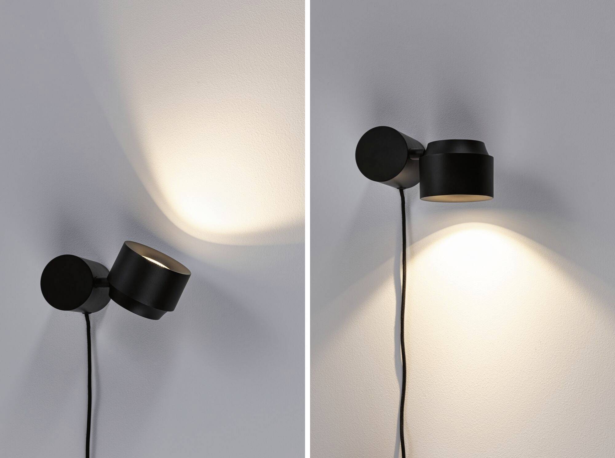 Dve moderné čierne nástenné svietidlá, jedno smerujúce nahor a druhé nadol, osvetľujú bielu stenu.