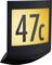 Čierna tabuľa s osvetleným žltým povrchom, na ktorej sú veľkými čiernymi číslicami napísané čísla '47c'.