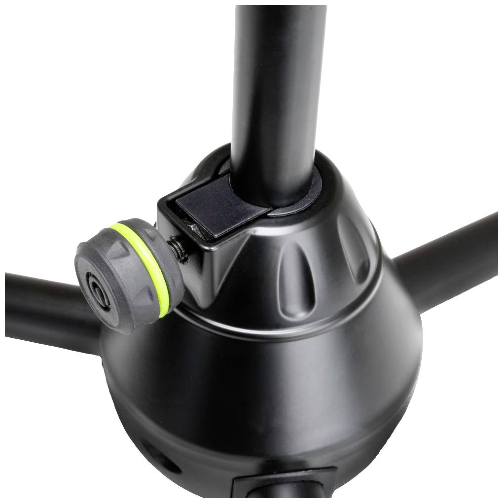 Detailný záber čierneho statívu s nastaviteľným kĺbom a zeleným akcentom. Poskytuje flexibilné nastavenie výšky.