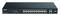 Čierny sieťový prepínač D-Link s 28 portmi, vybavený LED indikátormi a ethernetovými portami, používaný pre sieťové pripojenia v IT prostredí.