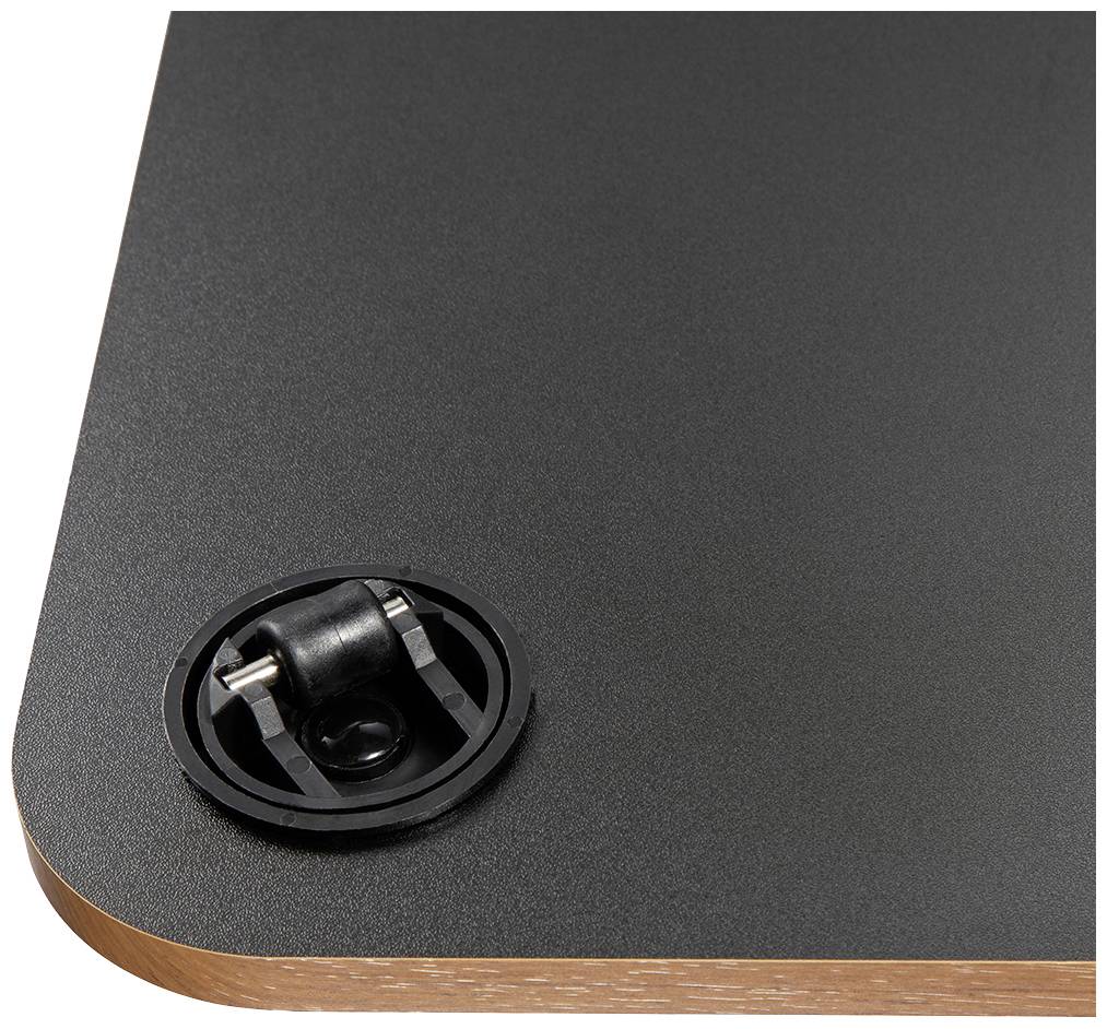 Čierna stolová doska so zaobľeným rohom a čiernym otvorom pre káble v rohu; na hrane viditeľná drevená vrstva.