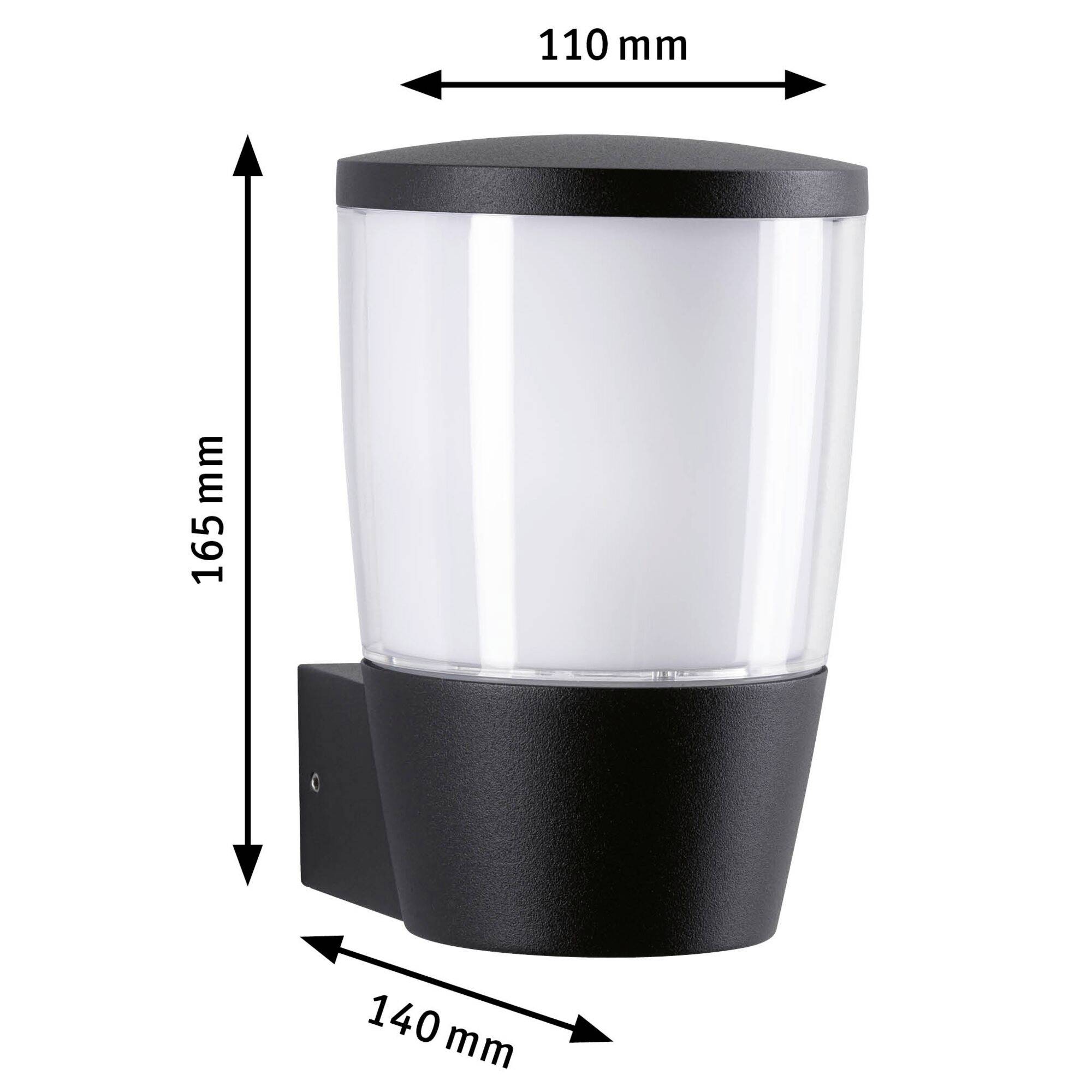 Cylindrická nástenná lampa s čiernym krytom a priehľadným sklom. Rozmery: výška 165 mm, šírka 110 mm, hĺbka 140 mm.