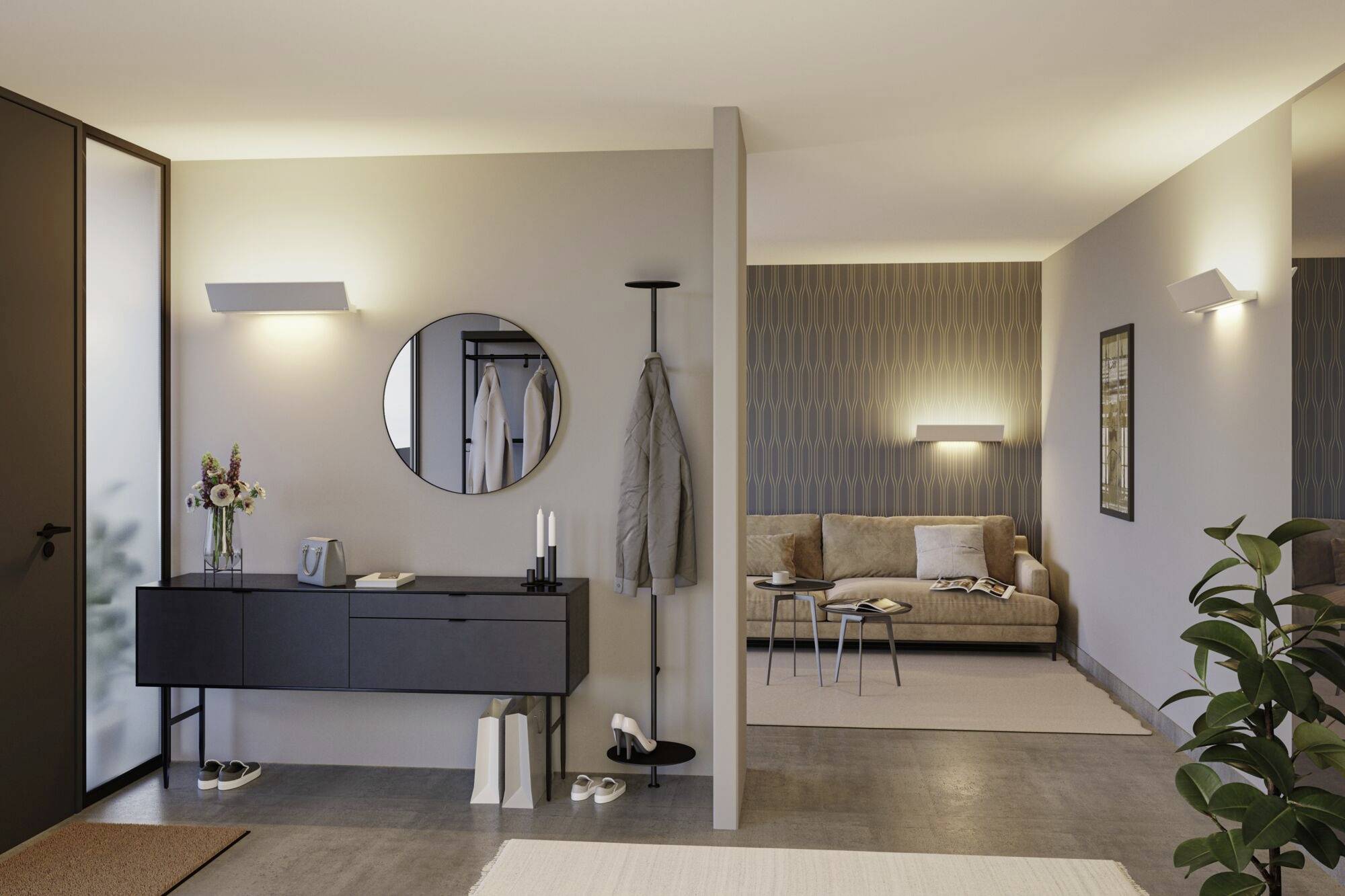 Moderná obytná scéna so sedačkou, konferenčným stolíkom a dekoratívnymi prvkami. Okrúhle zrkadlo a vešiak sú pripevnené na stene.