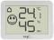 Digitálny teplomer a vlhkomer ukazuje 24,1°C a 45% vlhkosti vzduchu, usmievajúca sa tvár signalizuje príjemnú atmosféru v miestnosti.