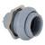 Sivý plastový prvok káblovej vývodky s kovovou maticou, pohľad z boku, zobrazuje spojovacie komponenty pre elektrické aplikácie.