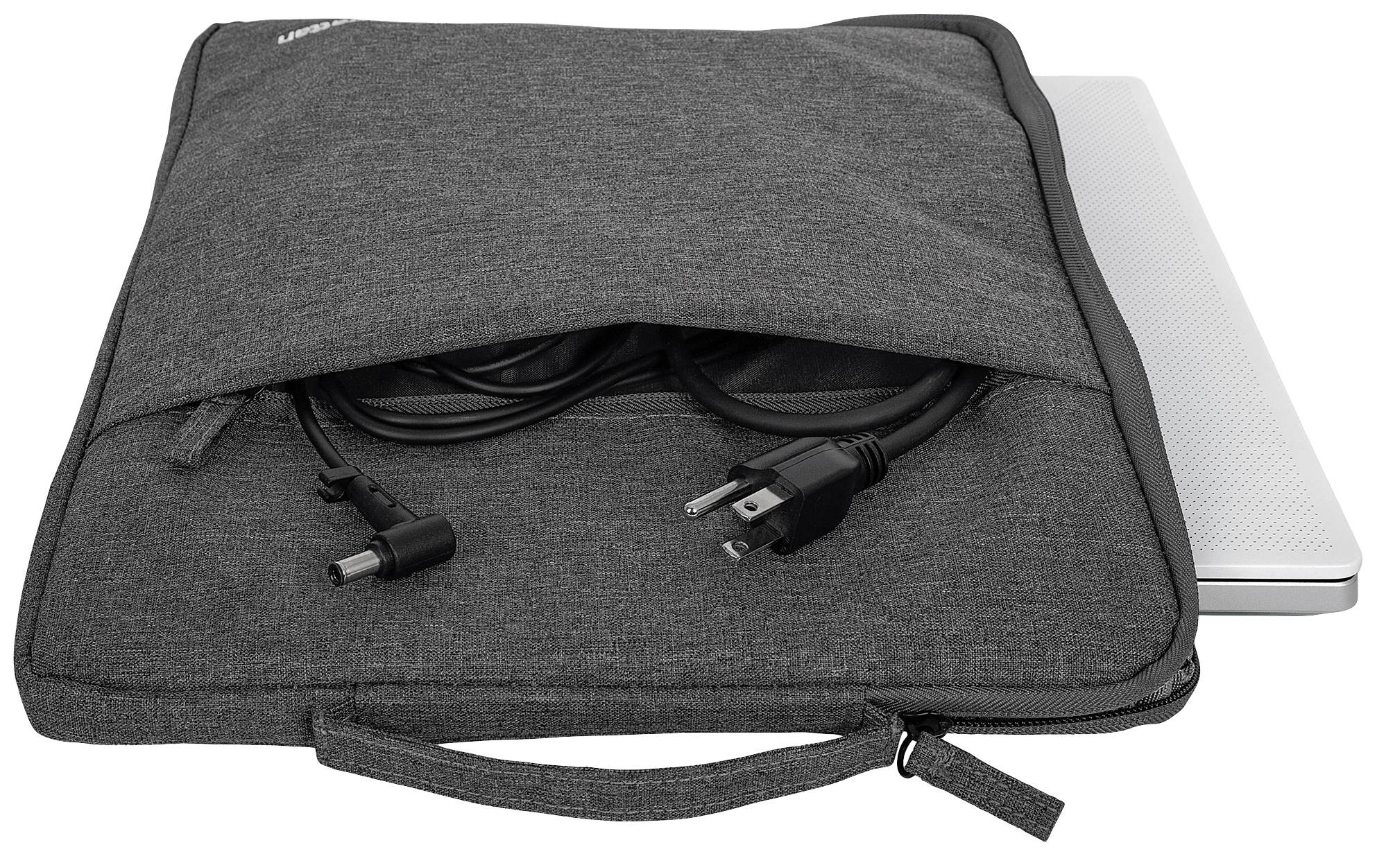 Sivá laptopová taška so zipsom, čiastočne otvorená, zobrazuje nabíjací kábel a laptop vo vnútri.
