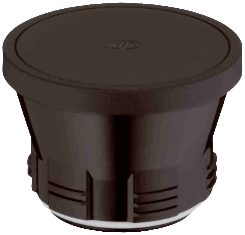 Hnedý plastový kryt s vrúbkovaným okrajom a vsadeným logom v hornej časti povrchu.