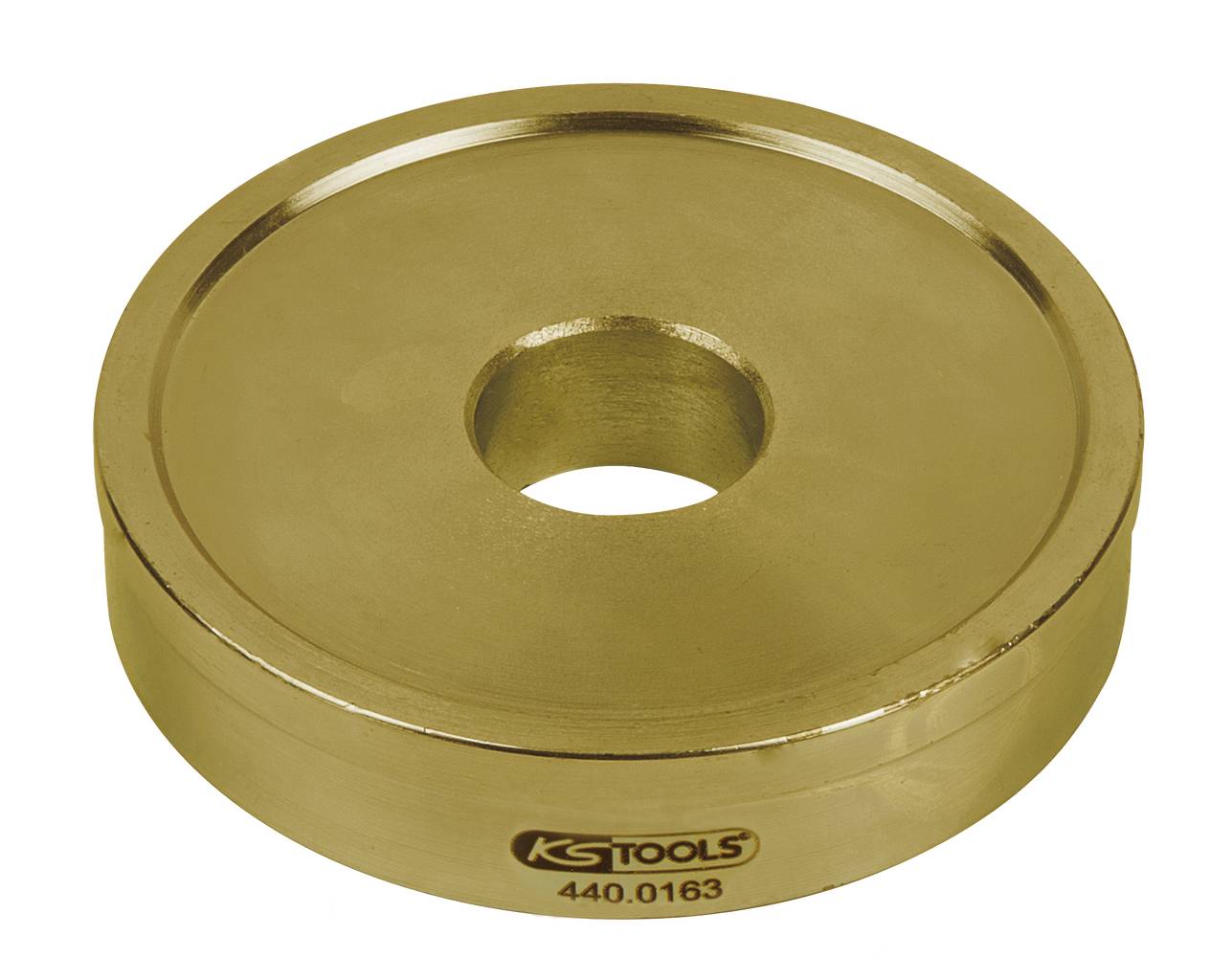 Zlatý, okrúhly kovový disk s otvorom uprostred. Na prednej strane je logo a číslo 'KG TOOLS 440.0163'.