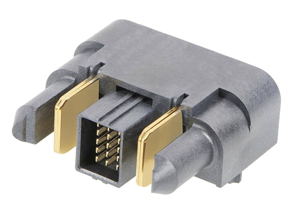 Čierny, obdĺžnikový elektronický konektor so zlatými kontaktmi.