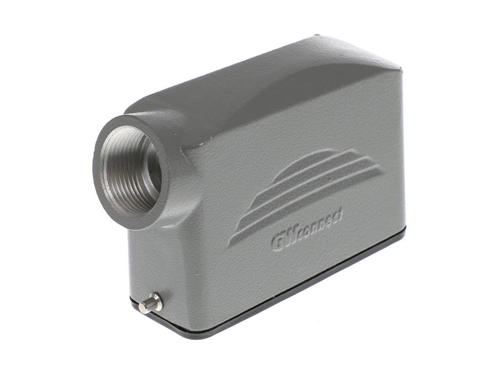 Sivý, obdĺžnikový kovový kryt so zaoblenými rohmi a bočným kruhovým otvorom. Razený so stupňovitým vzorom.