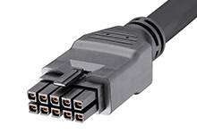 Čierny viacpólový konektor pre elektronické prepojenia, s viacerými obdĺžnikovými kolíkmi usporiadanými v dvoch radoch.