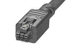Čierny šesťpólový konektor s plastovým obalom, vhodný pre elektrické pripojenia v elektronických zariadeniach.