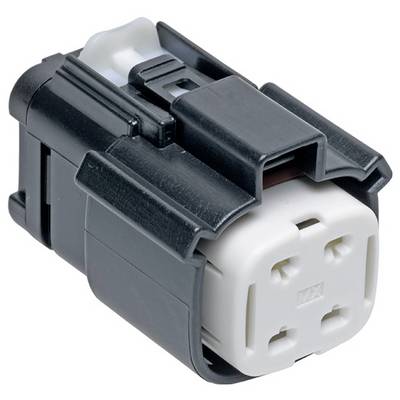 Zblízka pohľad na čierny a biely elektrický konektor s obdĺžnikovým tvarom a viacerými otvormi pre vodiče.