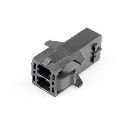 Čierny plastový konektor s viacerými portami obdĺžnikového tvaru, vhodný pre elektronické prepojenia.