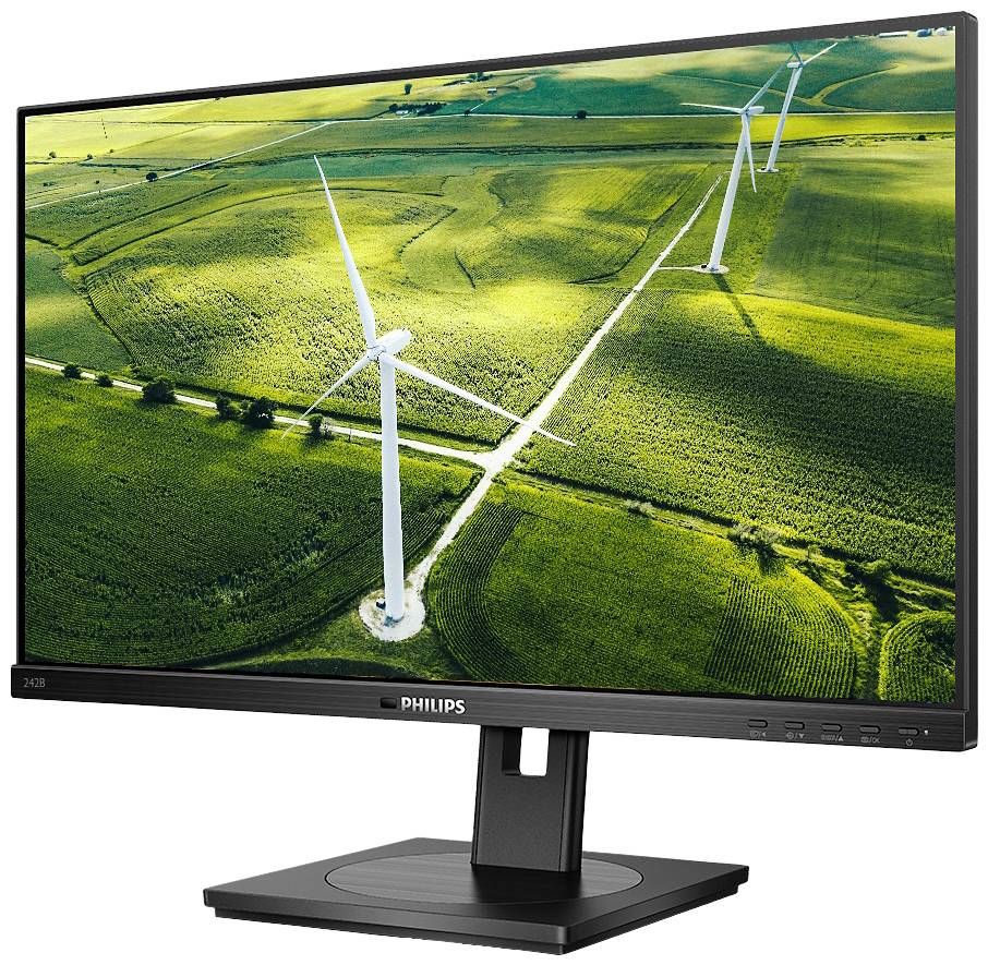 Monitor zobrazuje panoramatický obraz zelených polí s veternými elektrárňami, čo poukazuje na tému obnoviteľných zdrojov energie.