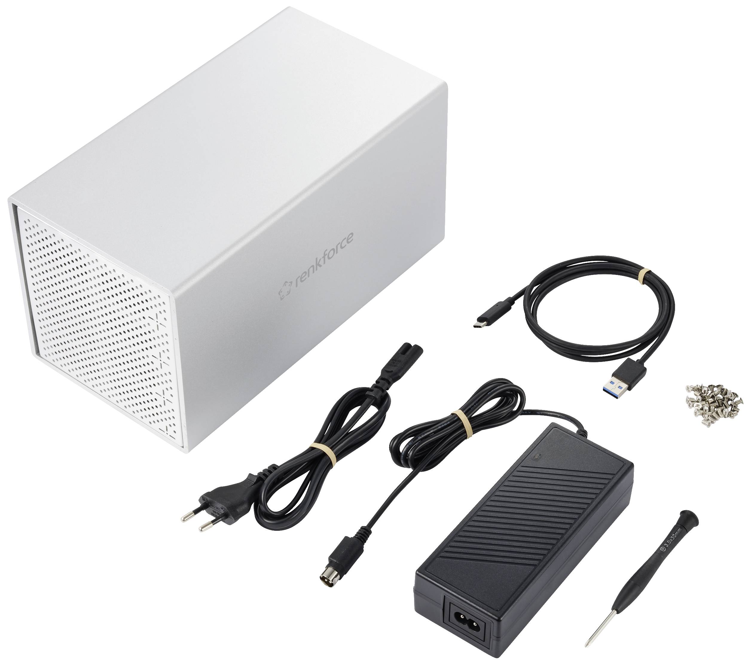 Externý pevný disk so strieborným krytom, napájací zdroj, USB kábel, sada skrutiek a skrutkovač.