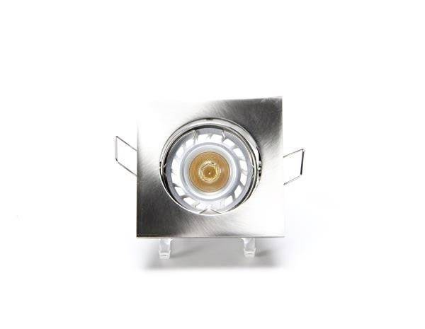 Štvorcový LED podhľadový svetlomet so strieborným rámikom a viditeľnou žiarovkou uprostred na bielom pozadí.