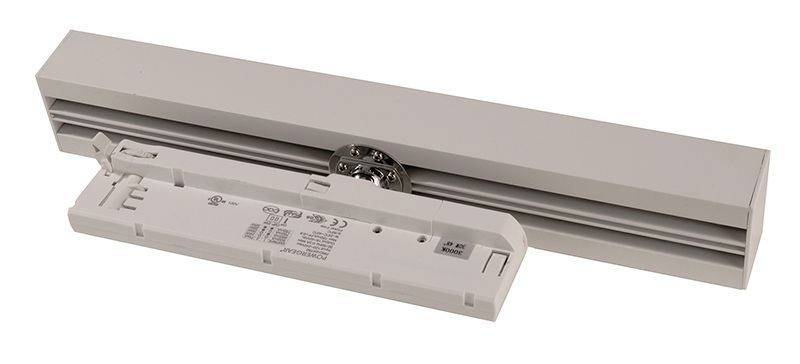 Mechanizmus na zatváranie dverí v obdĺžnikovom tvare, béžovej farby, s nápisom a symbolmi na povrchu, určený na automatické otváranie a zatváranie dverí.