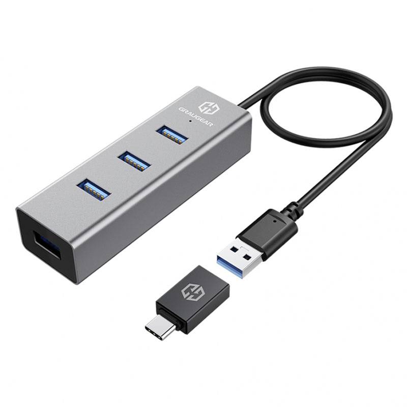 USB-C hub s tromi USB 3.0 portami a USB káblom. Súčasťou je adaptér z USB-C na USB. Zariadenie je umiestnené na bielom pozadí.